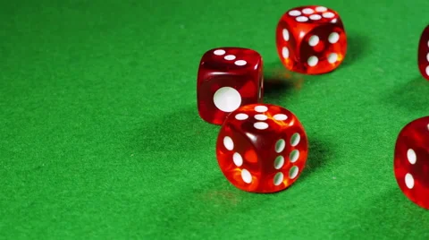 Red dices on the green cloth background. Rotation. Stock Footage 58864474