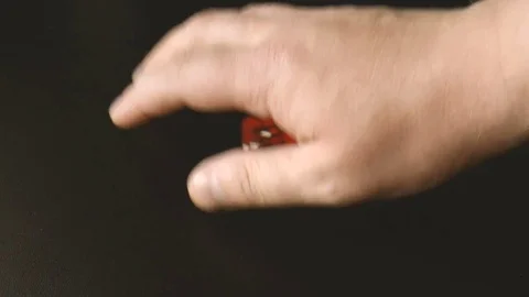 Red dices in hand Stock Footage 79409983