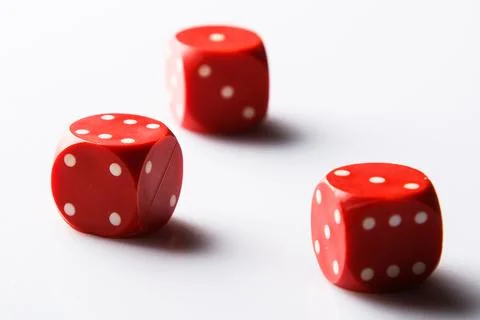 Red dices on white background Stock Photos