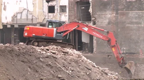 A red Digger in a construction area Stock Footage 45244413