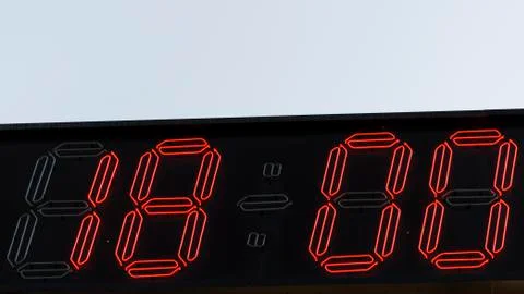 Red digits clock 18.00 Stock Photos