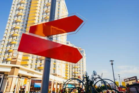 Red direction indicator on the pole Stock Photos