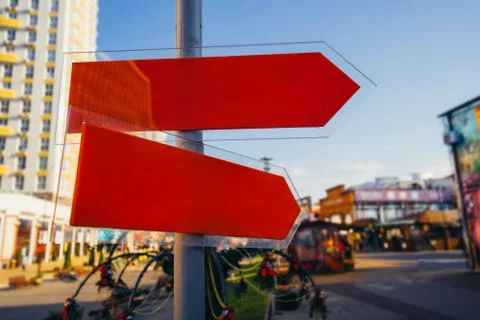 Red direction indicator on the pole Stock Photos