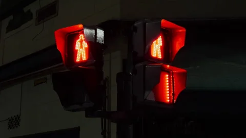 Red Directional Traffic Lights At Night Video stock 334947530