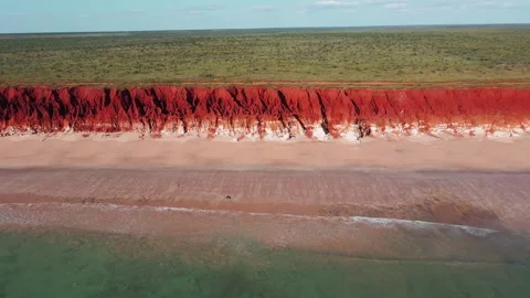 Red Dirt Cliffs Meet Turquoise Blue Ocean James Price Point Western Australia Stock Footage 276435483