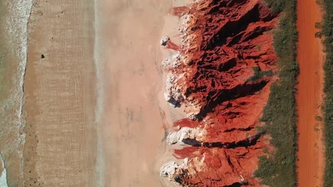 Red Dirt Cliffs Meet Turquoise Blue Ocean James Price Point Western Australia Stock Footage 276436891