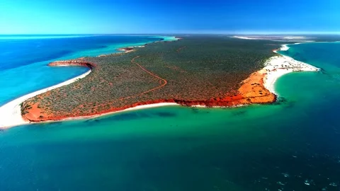 Red Dirt, White beach and Blue ocean, Western Australia Stock Footage