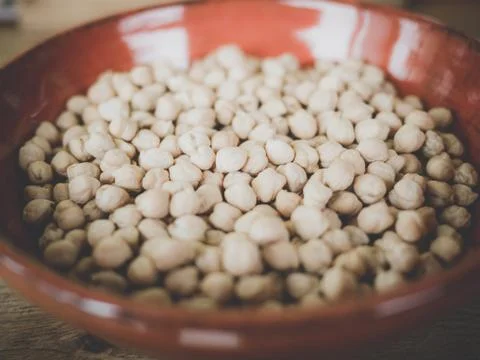 Red dish full of chickpeas, view fro above Stock Photos