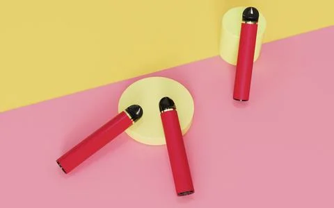 Red disposable electronic cigarette red and yellow minimalist background Foto stock