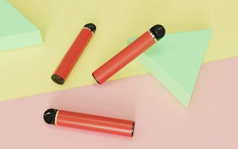 Red disposable electronic cigarette yellow light red minimalistic background Foto stock