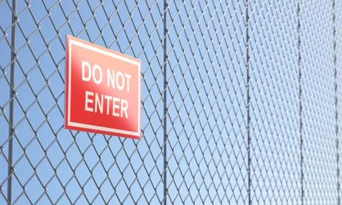 Red do not enter sign on metallic wire mesh fence Stock Illustration