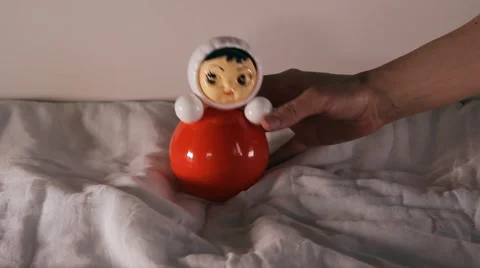 Red doll toy Video stock 45844340