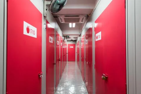 Red door in a corridor 스톡 사진