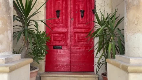 Red doorway with black knobs in Malta Stock-Footage 338131843