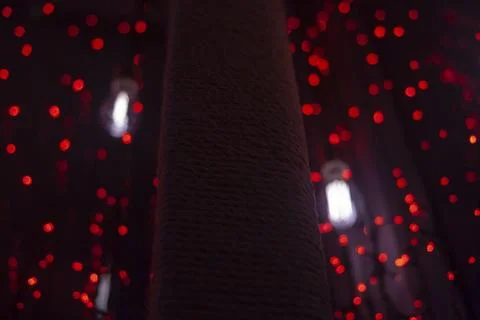 Red dots in space. Lights in dark. Red light bulbs. Lot of small lights in .. Stock Photos