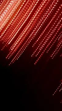 Red dotted lines of lights on a black background 스톡 일러스트