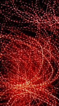 Red dotted lines of lights on a black background Stock Illustration