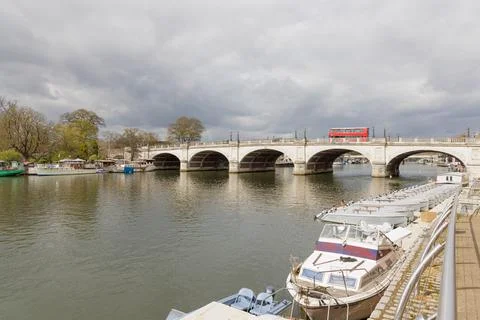 Red Double-Decker Bus Crosses Kingston Bridge 스톡 사진