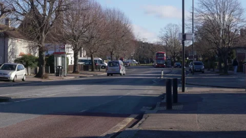Red Double Decker Bus In Quiet Street In London Stock Footage 327368102
