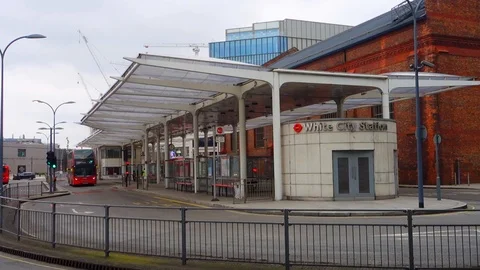 Red double decker bus at White City Bus Station in Shepherd's Bush, London Stock Footage 106208357