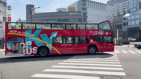 Red Double Decker Sightseeing Tour Bus Driving Through Kyoto City Street Stock Footage 333604678