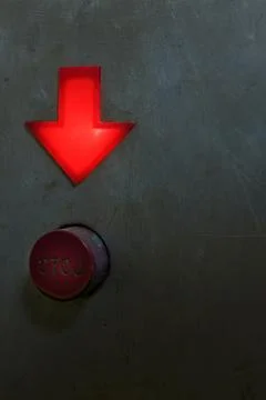 Red down arrow and stop button Stock Photos