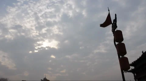 Red dragon flag along and Lantern in the top of Xian City Wall Stock Footage 905295