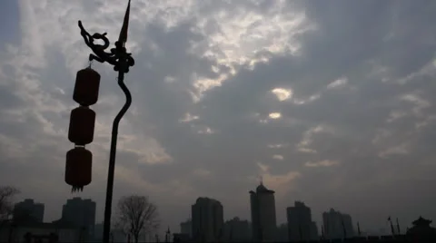 Red dragon flag along and Lantern in the top of Xian City Wall Stock Footage 905378