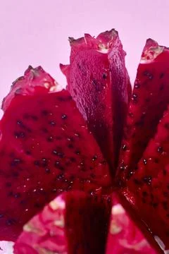 Red dragon fruit Set with appetizing serving on pink background. Top view Stock Photos