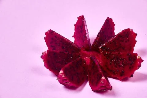 Red dragon fruit Set with appetizing serving on pink background. Top view Stock Photos