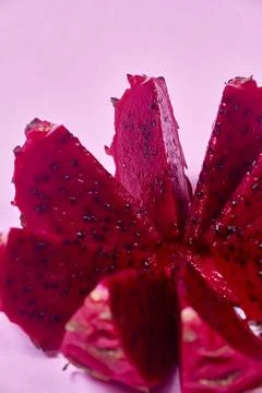 Red dragon fruit Set with appetizing serving on pink background. Top view Stock Photos