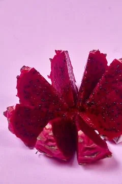 Red dragon fruit Set with appetizing serving on pink background. Top view Stock Photos