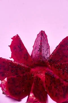 Red dragon fruit Set with appetizing serving on pink background. Top view Stock Photos