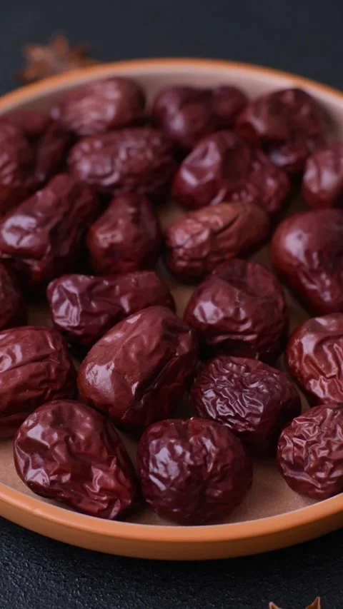 Red dried dates, the Chinese sweet fruit jujube, as a healthy food. Red dates, j Stock Footage 326731878