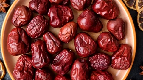 Red dried dates, the Chinese sweet fruit jujube, as a healthy food. Red dates, j Stock Footage 326732689