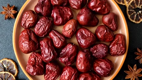 Red dried dates, the Chinese sweet fruit jujube, as a healthy food. Red dates, j Stock Footage 326732700