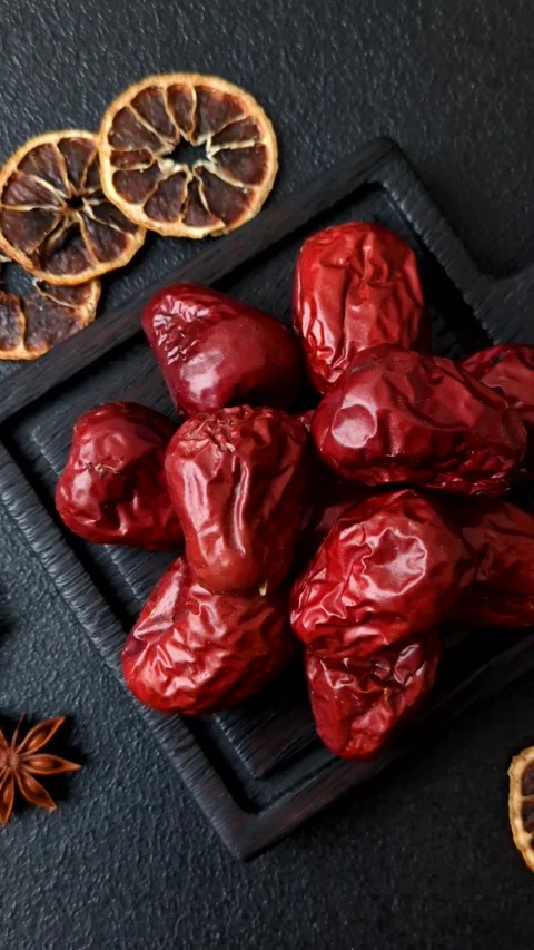 Red dried dates, the Chinese sweet fruit jujube, as a healthy food. Red dates, j Stock Footage 326732793