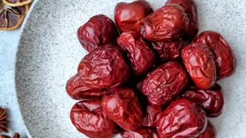 Red dried dates, the Chinese sweet fruit jujube, as a healthy food. Red dates, j Stock Footage 326732826