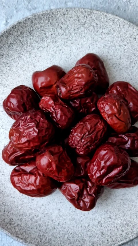 Red dried dates, the Chinese sweet fruit jujube, as a healthy food. Red dates, j Stock Footage 326732863