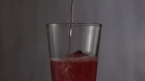 Red drinks pour slow motion. Stock Footage 278538771