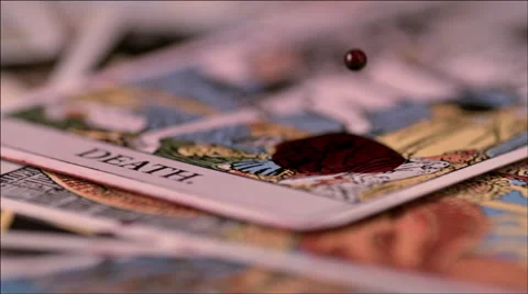 Red drops falling on death tarot card Stock Footage 46668615