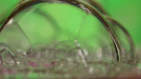 Red Drops Slide Down Clear Bubble Stock Footage 75492349
