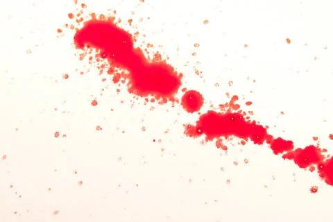 Red drops on white Stock Photos