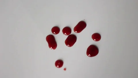 Red drops on a white surface Vídeo Stock 71950926