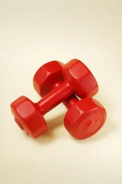 Red dumbells Stock Photos