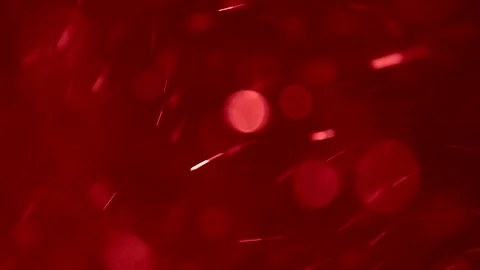 Red dust, circles, bokeh effect randomly moving in different directions on .. Stock Footage 250626428