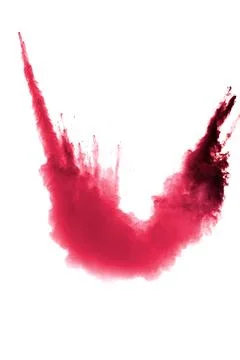 Red dust explosion on white background. Freeze motion of red powder splash. Stock Photos