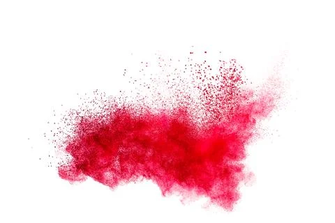 Red dust particles explosion on white background.Red sand splatter. Foto stock
