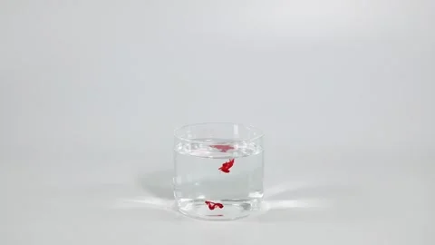 Red Dye Diffusing in Water Stock Footage 277329938