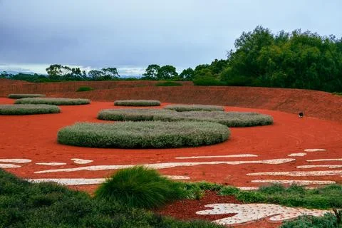 Red earth landscape with circular native plant formations Stock Photos